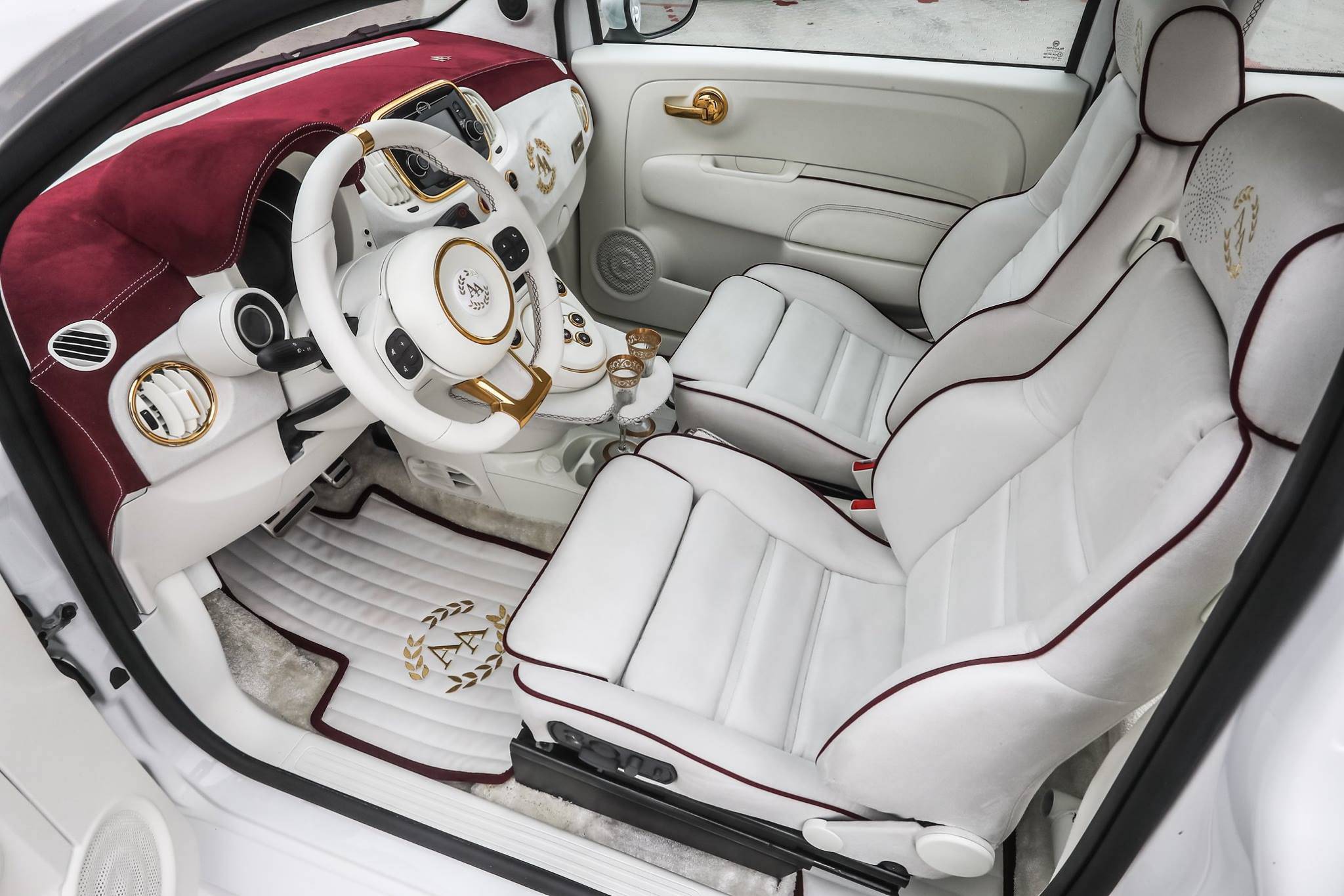 Romeo Ferraris | Il Cinquone Qatar, sportività e lusso per il mercato arabo 1 cinquone qatar is a 248 hp fiat 500 with champagne glasses and gold details 10